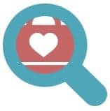 a magnifying glass that enlarges a heart on an office bag